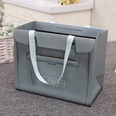 Creative ladies handbag shape luxury paper bags cosmetic shop present packaging paper bags with logo