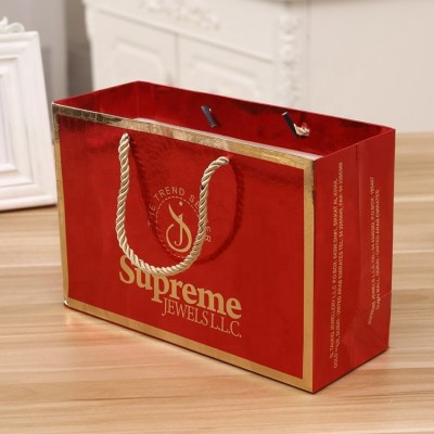 Luxury Gift Paper Bag Custom Made Printed Logo Jewelry Packaging Kraft Shopping Paper Bag With Ribbon Handles